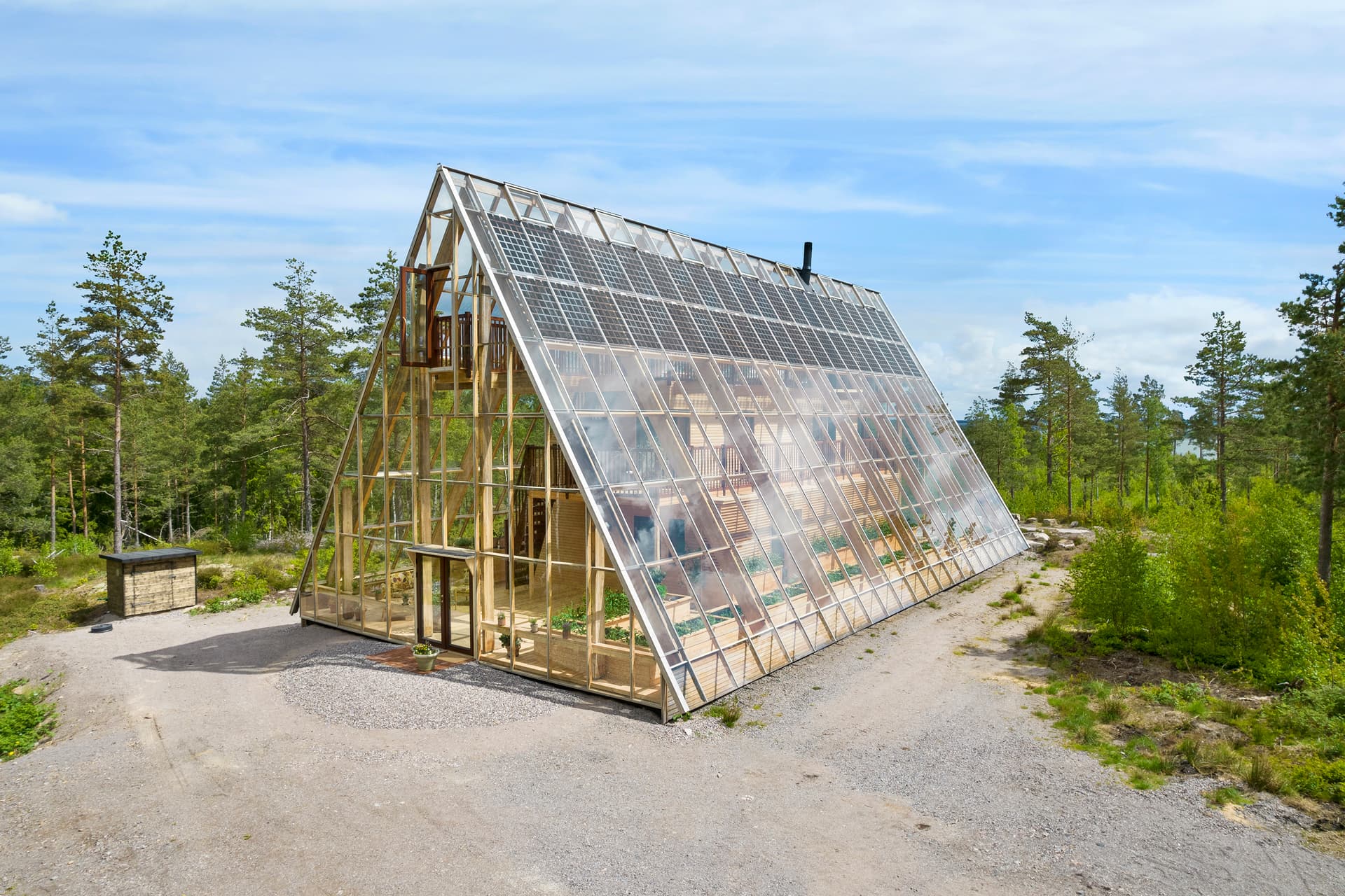 Hus i ett växthus.